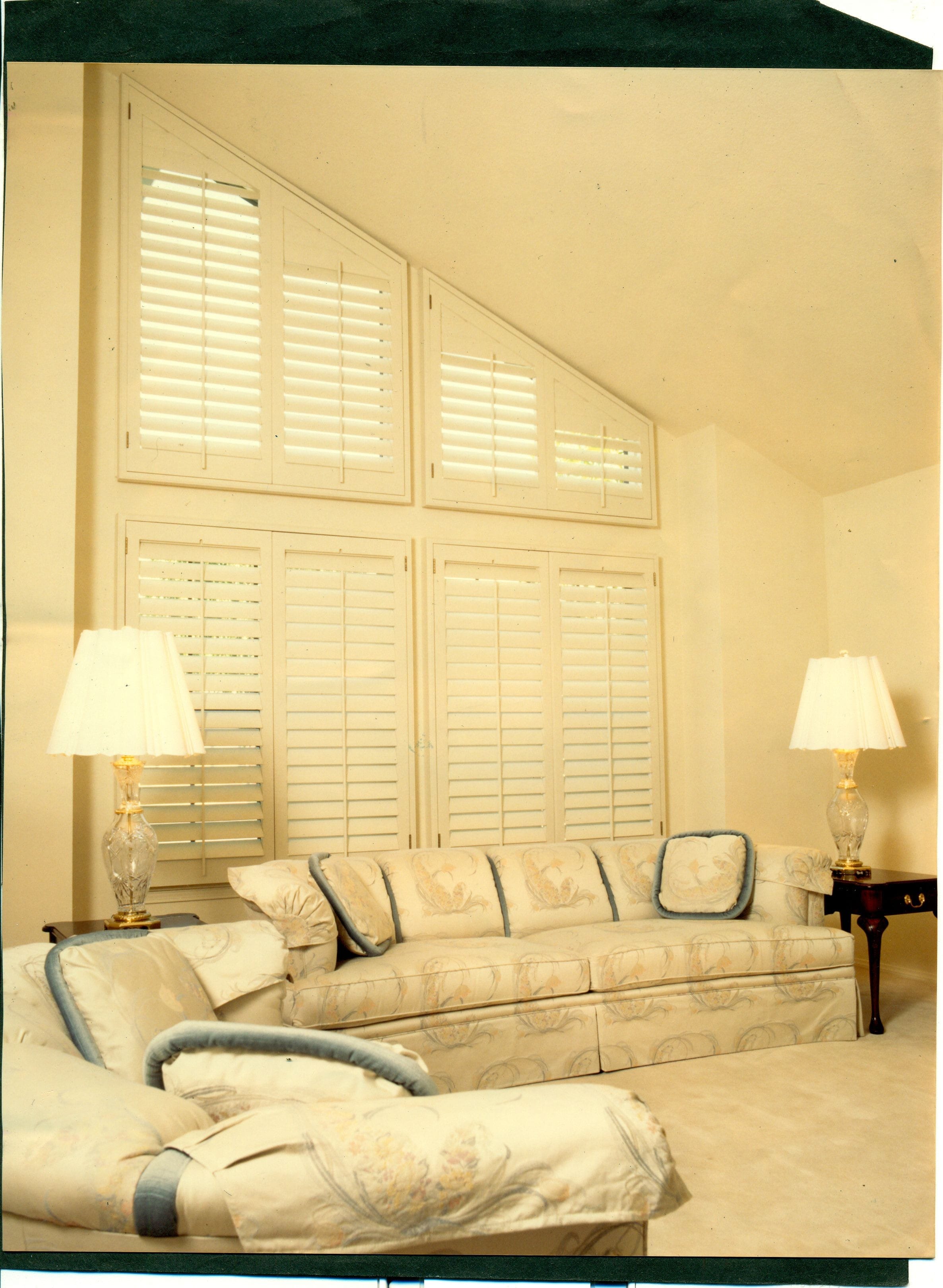 Living Room With Full Size Sloped Window Shutters