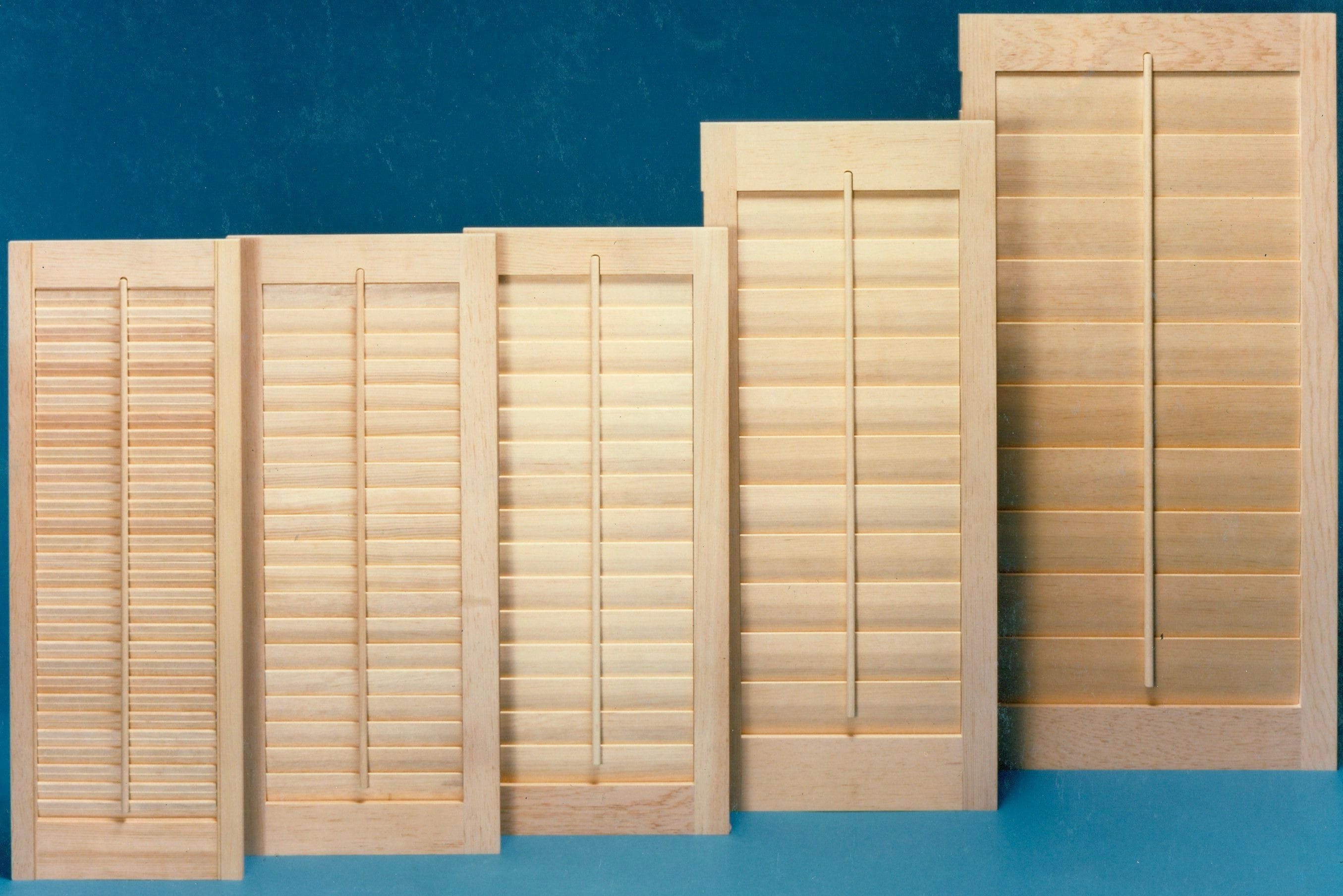 Close Window Shutter Panels In A Teal Background