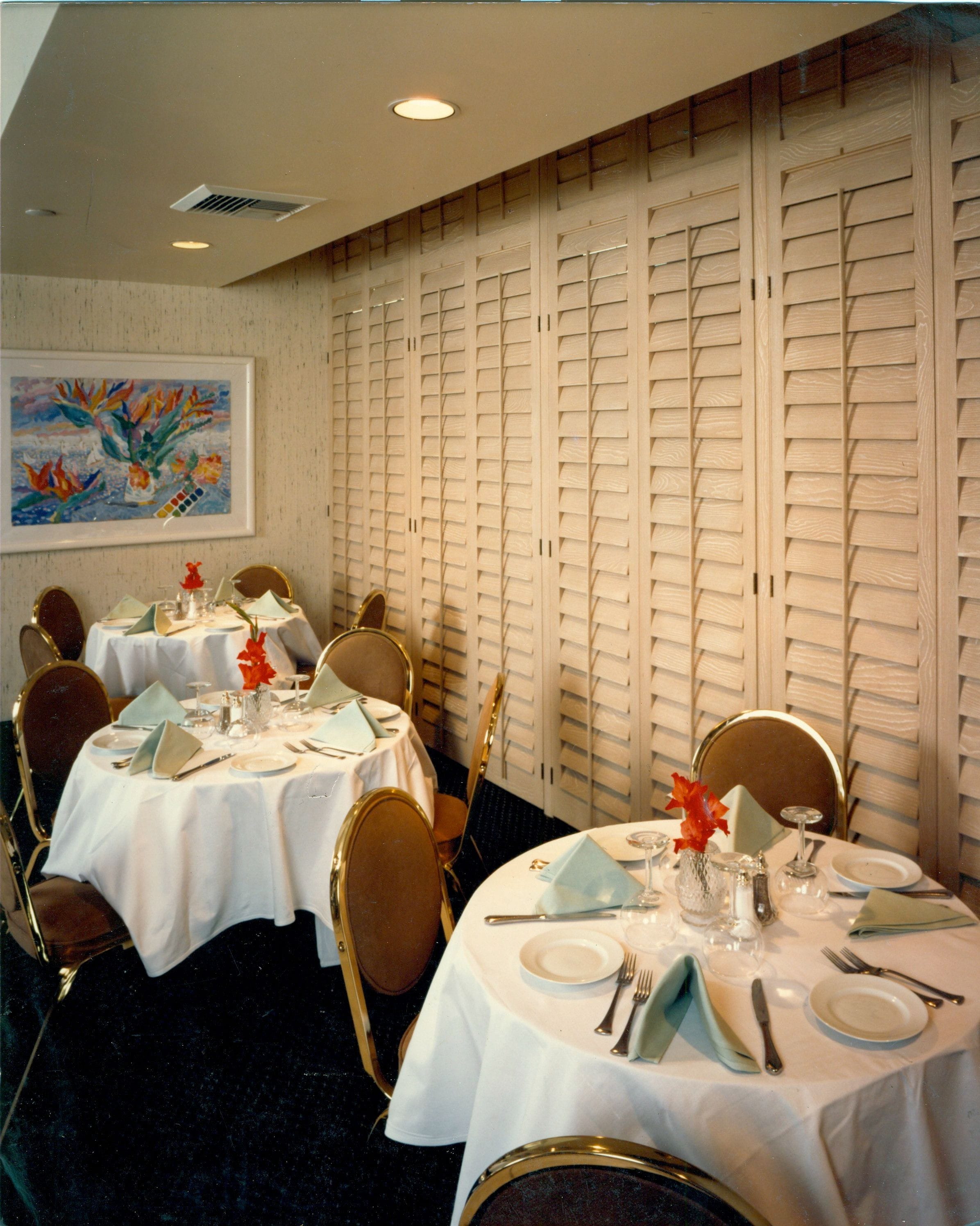 White Window Shutter Panels And Dining Tables