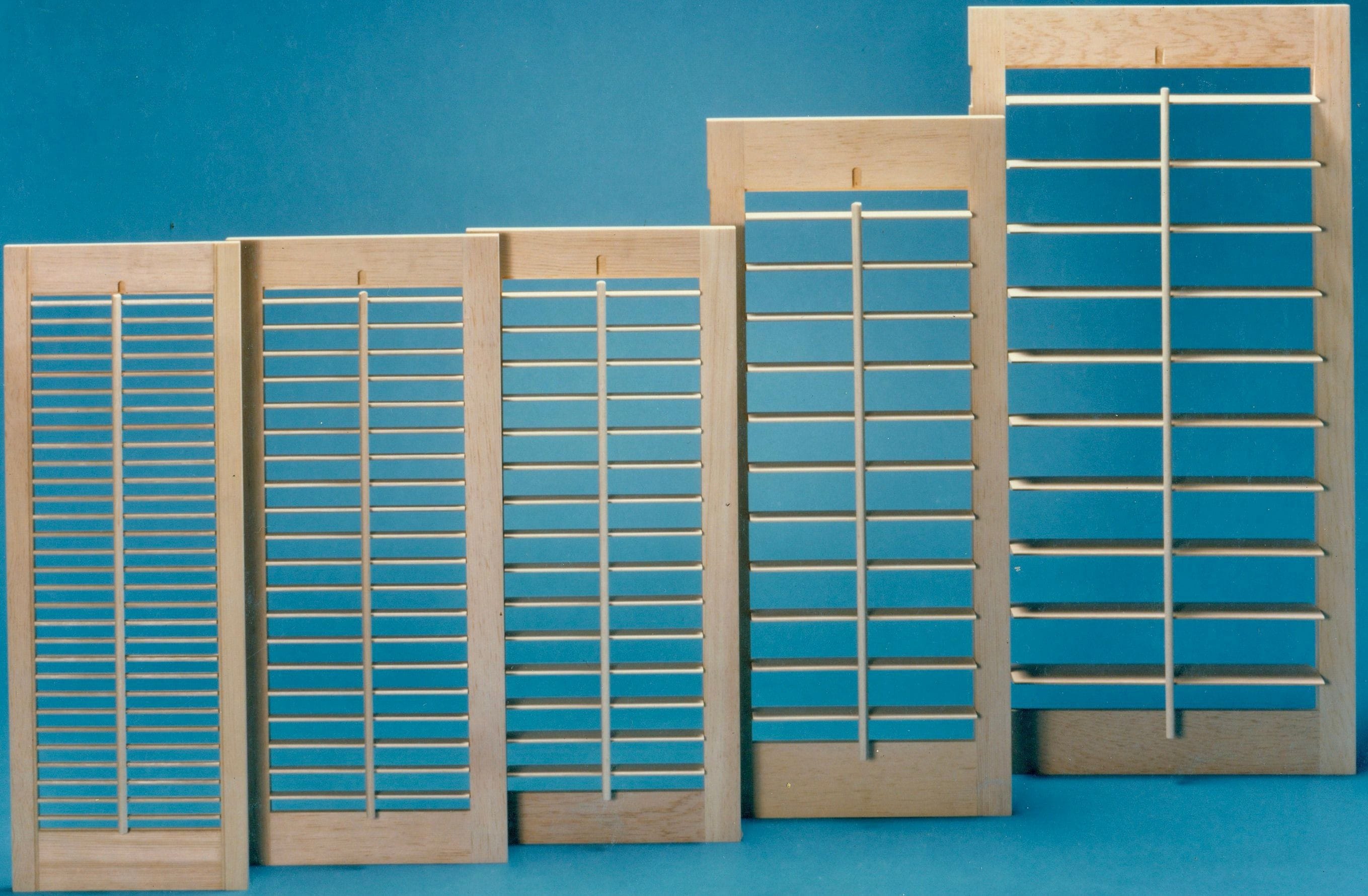 Window Shutter Panels In A Teal Background